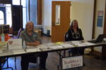 Brenda Cole and ReVah Loring welcome table