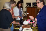 Lisa Haneberg serves cake